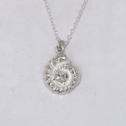 Small silver ammonite pednat with square cubic zirconia